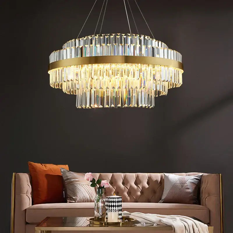Modern gold dimmable led pendant light with decorbites gold metal and cascading crystal prisms for dining room decor