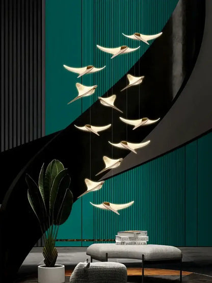 Modern gold dolphin pendant chandelier with white and gold-toned metal minimalist bird-shaped lights for hotel lobby decorbites dolphin pendant