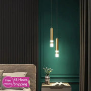 Modern gold double head led pendant lights with illuminated white bands hang from ceiling for bedroom lighting