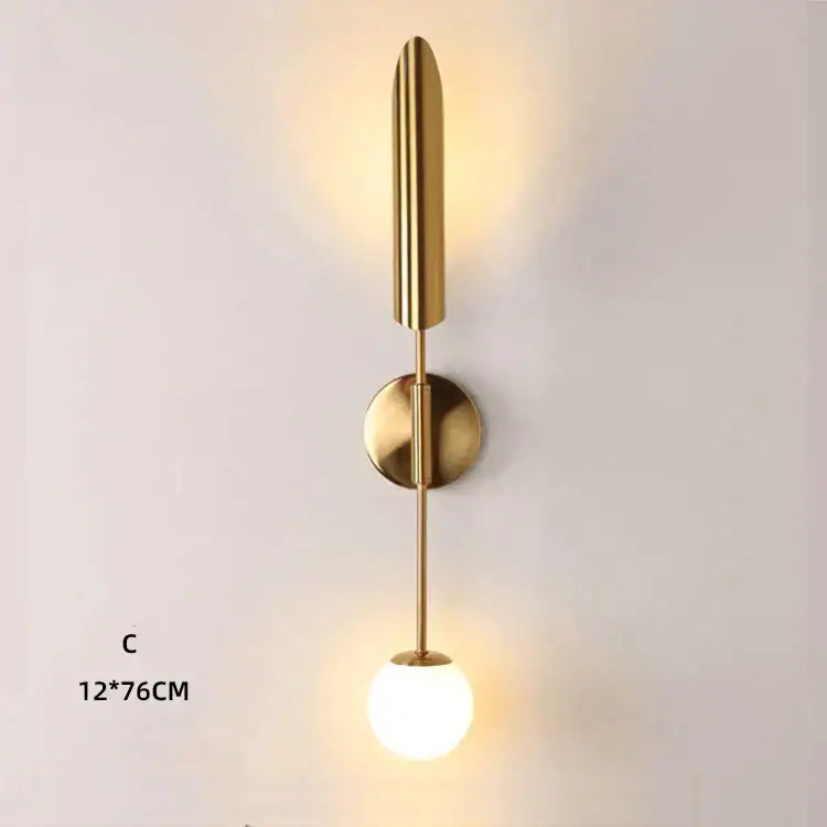 Modern gold double-head wall lights with sleek elongated stem and frosted glass globe for living room decorbites wall lights