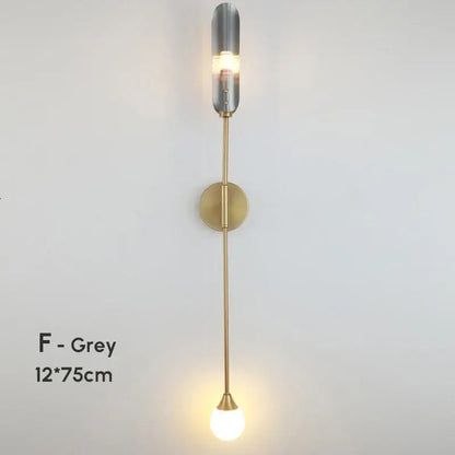 Modern gold double-head wall lights with brushed brass finish and clear frosted glass shades for living room decorbites double-head wall