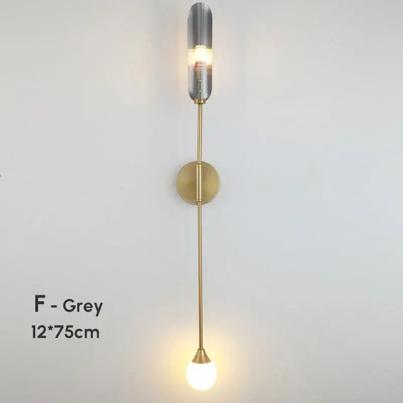 Modern gold double-head wall lights with brushed brass finish and clear frosted glass shades for living room decorbites double-head wall