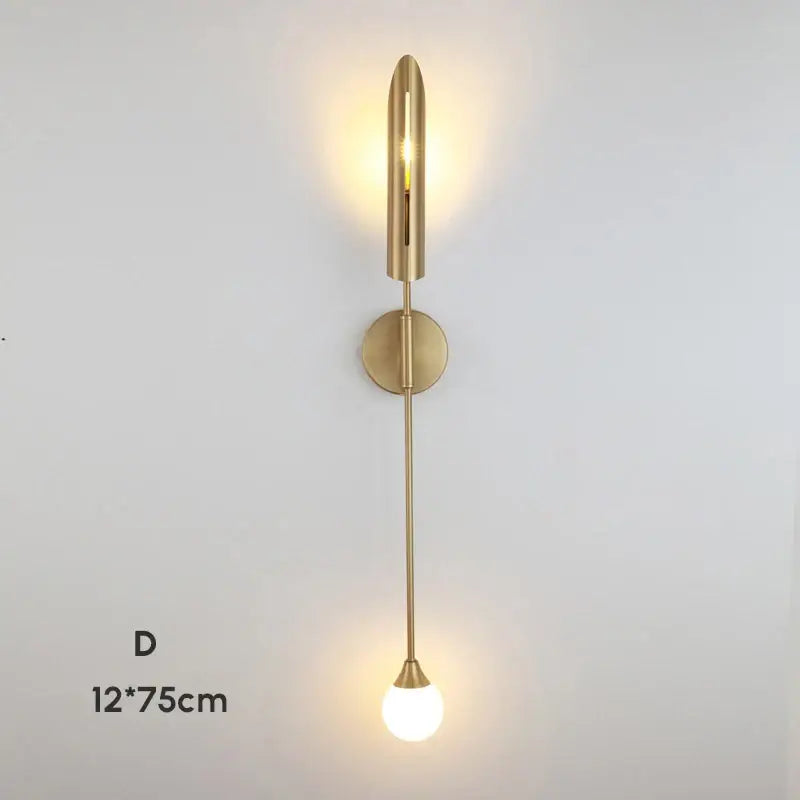Modern gold-toned decorbites double-head wall lights with sleek cylindrical top and spherical glass bulb for living room decor