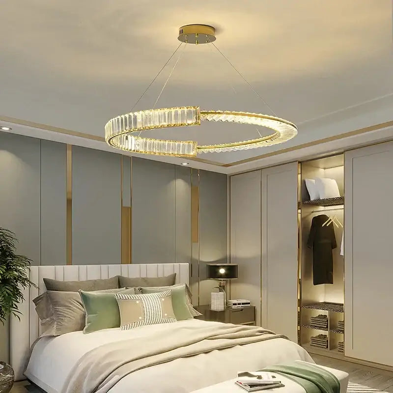 A modern gold double ring decorbites crystal chandelier with clear crystal accents for dining room lighting