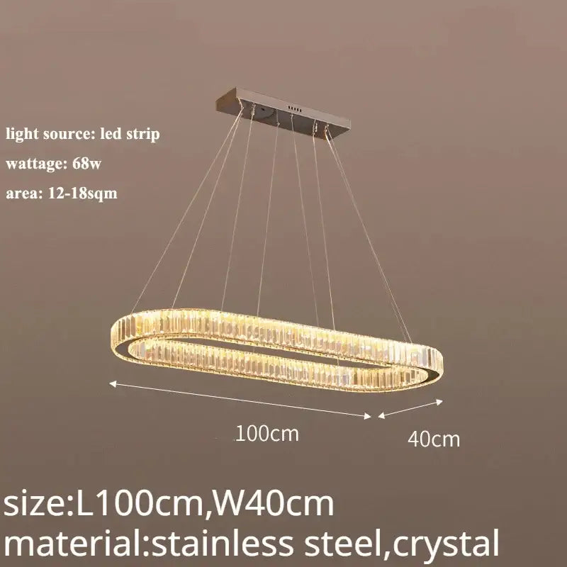 A modern gold decorbites crystal led chandelier with oval stainless steel frame and LED strip for dining room use