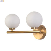 Modern gold led wall sconce with two frosted glass ball shades for bedroom wall lights