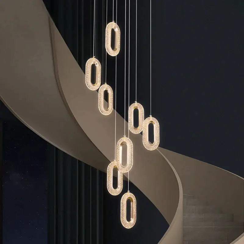 Modern gold-toned oval duplex crystal chandelier with sparkling crystals for villa living room lighting