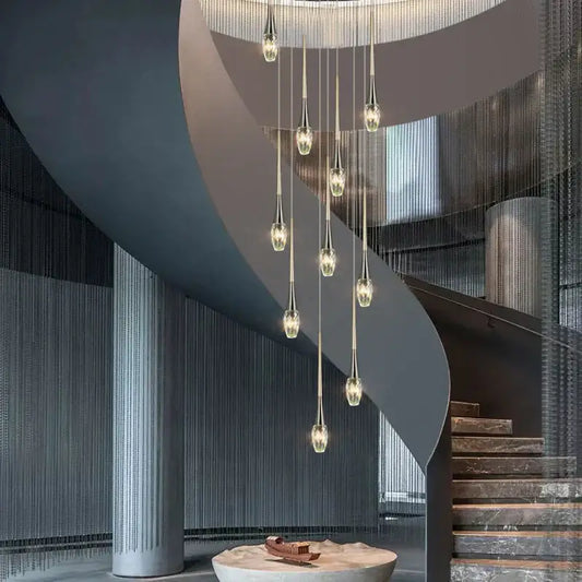 Modern gold elegant crystal chandelier with slender metal arms and clear teardrop bulbs for living room decorbites elegant crystal