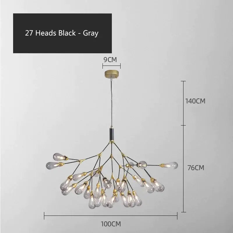 A decorbites elegant firefly chandelier with 27 black and gray glass bulbs in a brass branching design for dining rooms