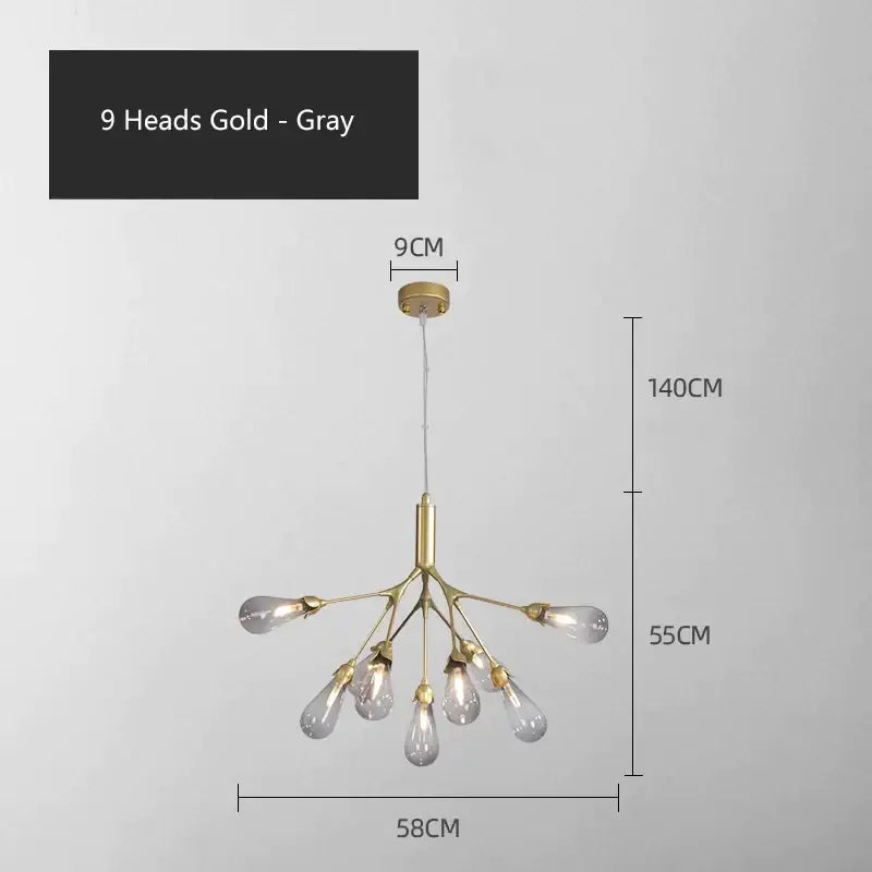 Modern gold elegant firefly chandelier featuring nine clear glass teardrop bulbs and central brass fixture by decorbites elegant firefly