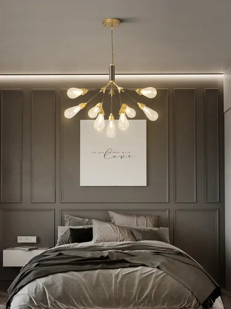 Modern gold elegant firefly chandelier with multiple exposed filament bulbs in radial pattern for dining room decorbites elegant firefly