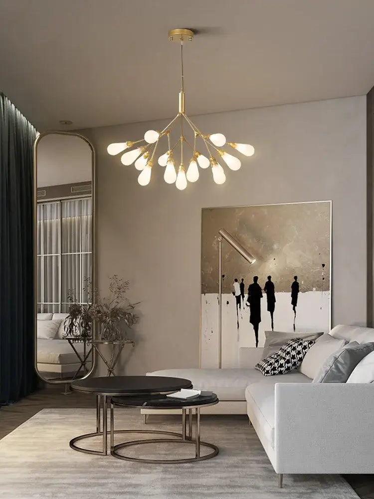 Modern gold elegant firefly chandelier with multiple exposed bulbs in a branching design for dining room decorbites elegant firefly