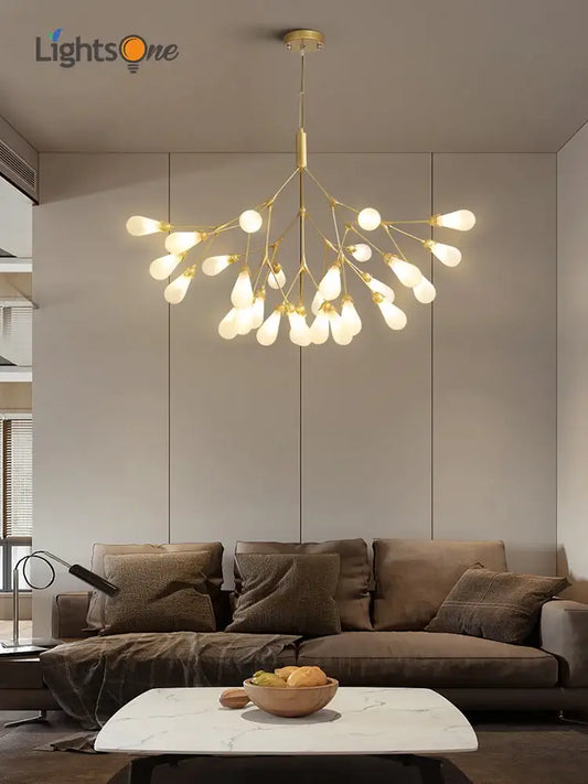 Modern gold elegant firefly chandelier with multiple exposed bulbs in a branching design for dining room decorbites elegant firefly