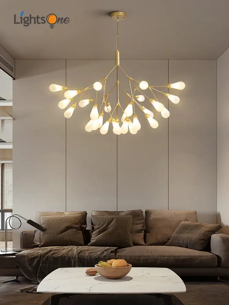 Modern gold elegant firefly chandelier with multiple exposed bulbs in a branching design for dining room decorbites elegant firefly