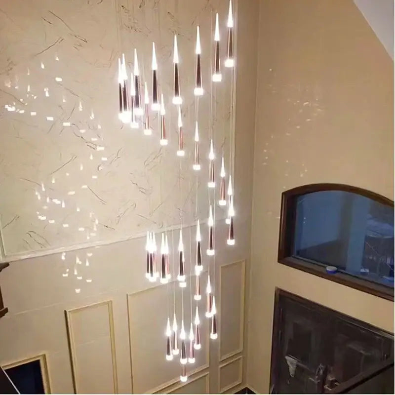 Modern gold elegant led ring chandelier featuring cascading tapered glass with rose gold and silver metallic accents for decorbites elegant led decor