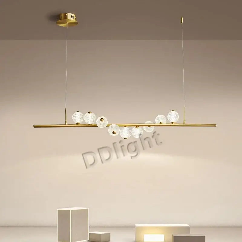 Modern gold elegant pearl necklace chandelier with sleek horizontal bar and spherical glass globe bulbs for living room decorbites elegant pearl
