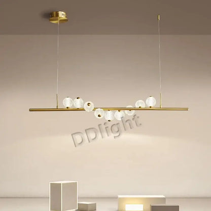 Modern gold elegant pearl necklace chandelier with sleek horizontal bar and spherical glass globe bulbs for living room decorbites elegant pearl