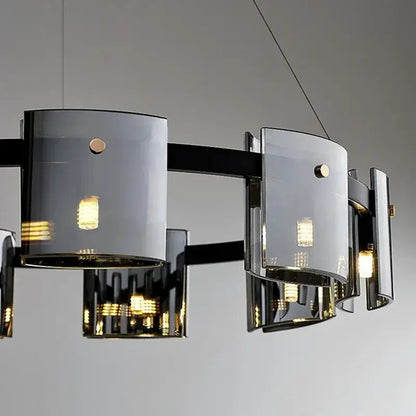 Modern gold elegant smoky glass chandelier with black frame curved shades and gold-toned accents for dining room decorbites elegant smoky
