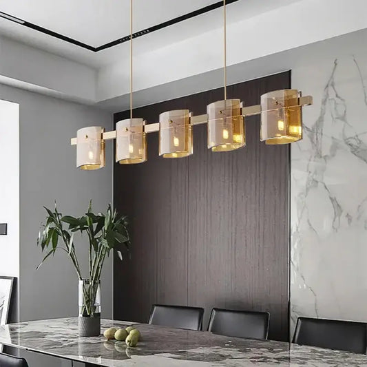 Modern gold elegant smoky glass chandelier with five cylindrical shades suspended by thin rods for dining room decorbites elegant smoky