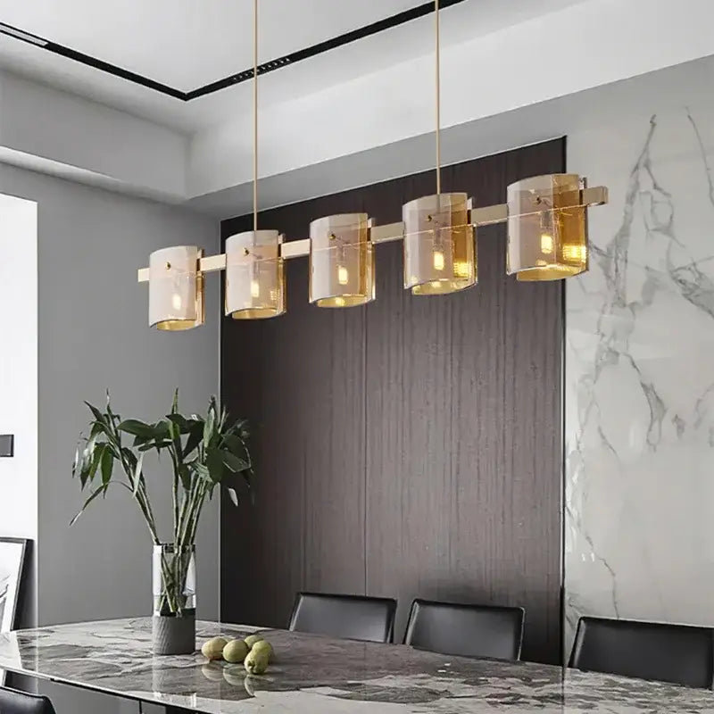 Modern gold elegant smoky glass chandelier with five cylindrical shades suspended by thin rods for dining room decorbites elegant smoky