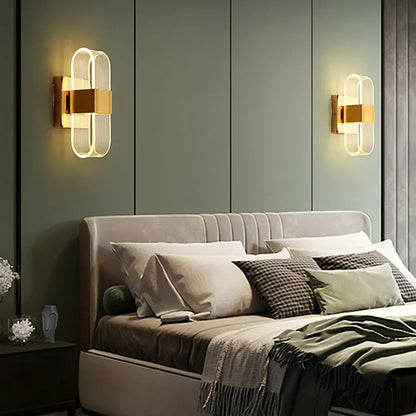 Modern gold elliptical led wall lamp featuring gold-accented oval glass panels for bedroom decorbites elliptical led wall use