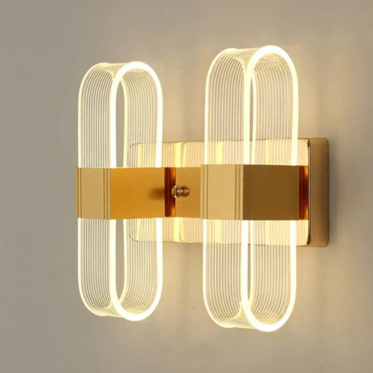 Modern gold elliptical led wall lamp with two curved acrylic light fixtures for bedroom decorbites elliptical led wall lighting