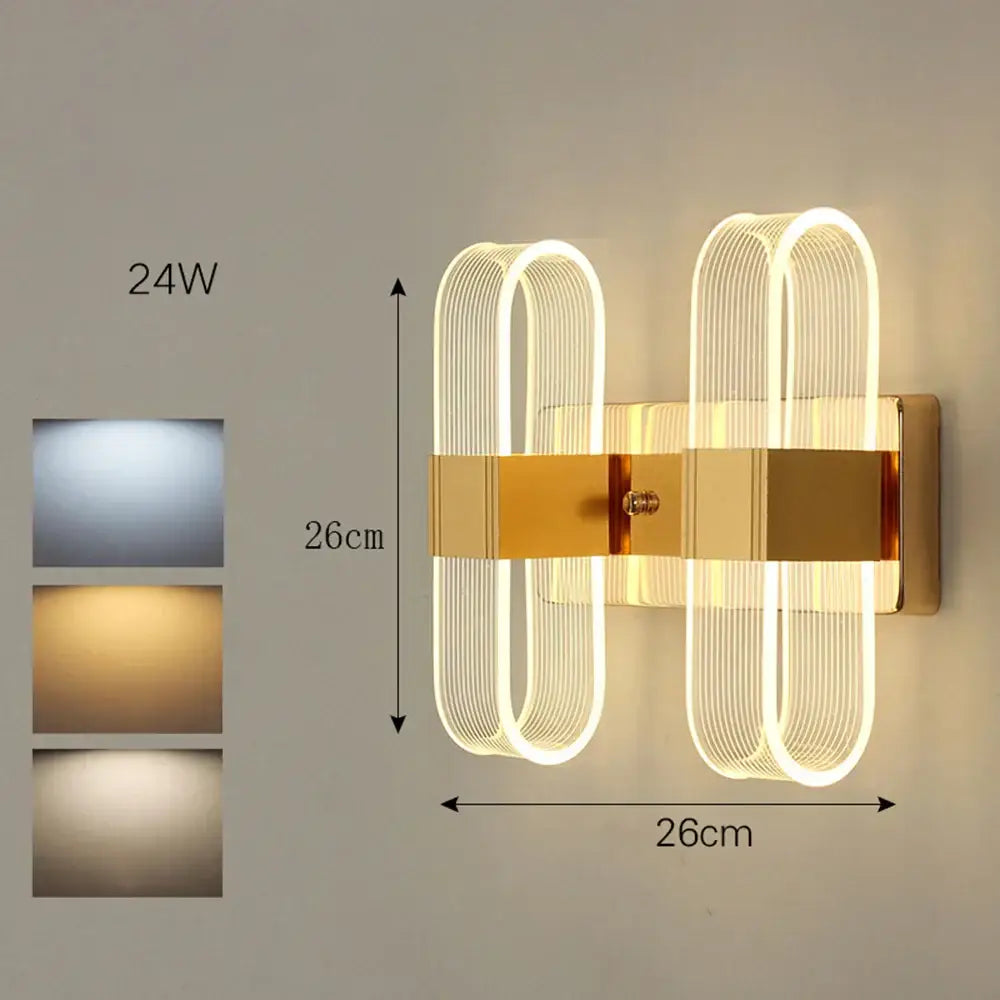 Modern gold elliptical led wall lamp with two illuminated ribbed oval shapes and central rectangular accent for decorbites