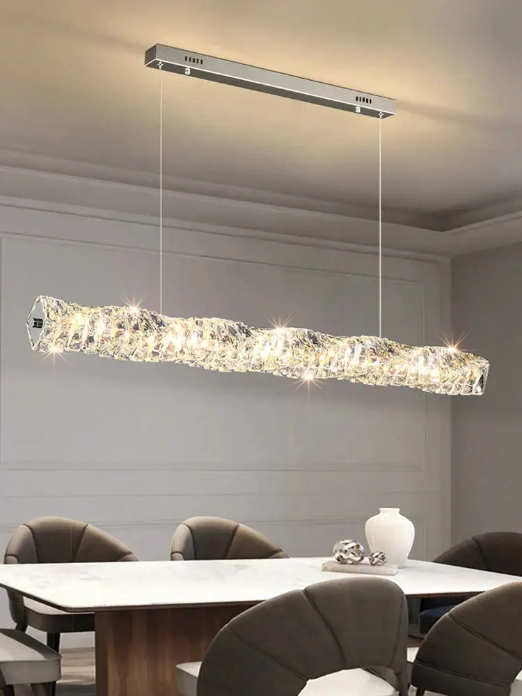 Modern gold elongated glass chandelier led ceiling light with sleek silver metal frame and embedded led lights for dining room