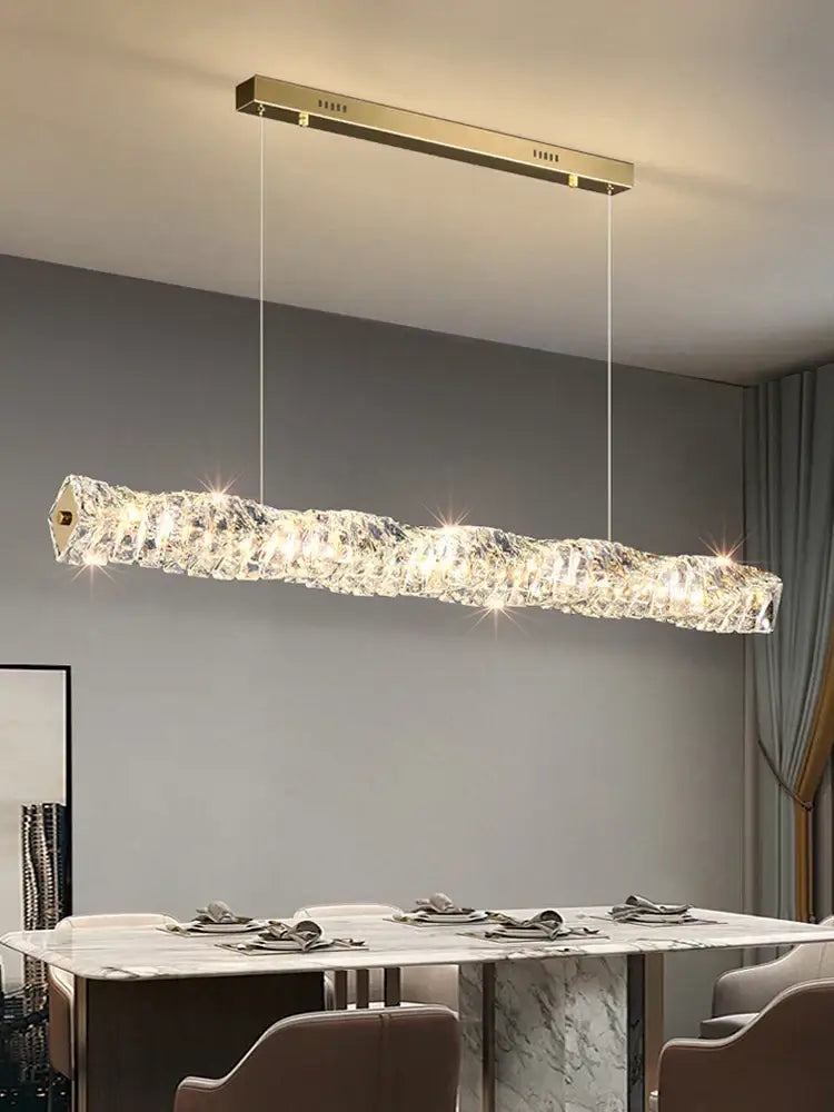 Modern gold elongated glass chandelier led ceiling light with rectangular mount and hanging wires for dining room