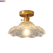 Modern gold-toned led ceiling lamp with intricately etched clear glass shade featuring leaf-like patterns for living room
