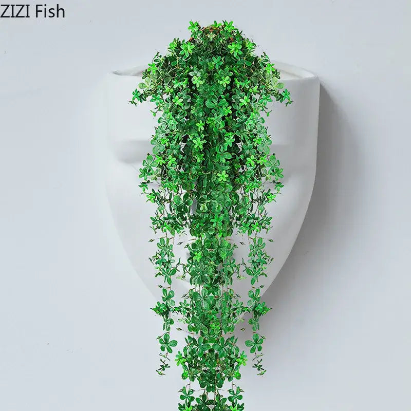 Modern gold decorbites ceramic wall-mounted vase with green artificial ivy in white face-shaped planter for living room decor