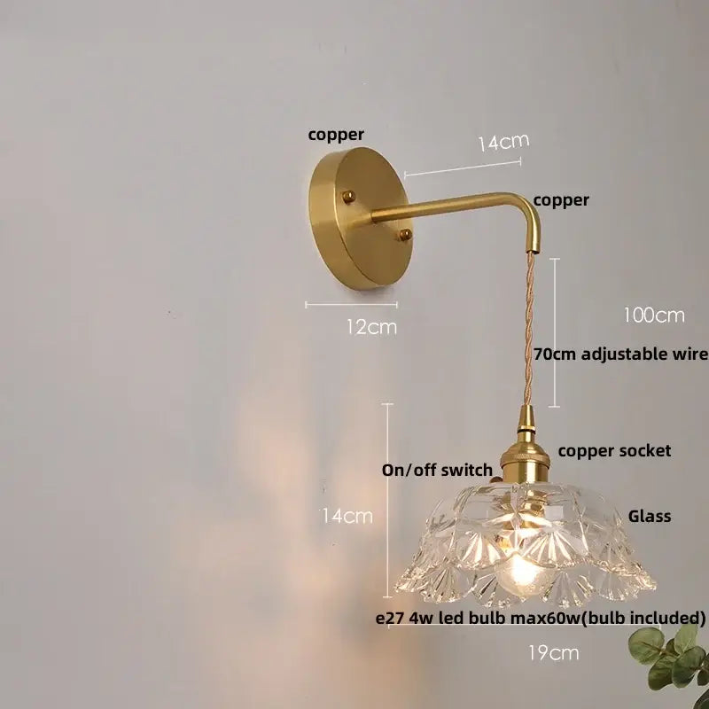 Antique brass-finished copper wall lamp with clear glass faceted shade and adjustable wire for modern bedroom wall light
