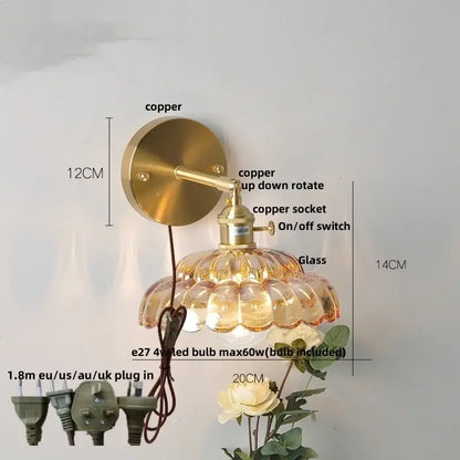 Modern gold brass-finished wall light with faceted clear glass amber shade and adjustable arm by decorbites clear glass