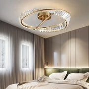 Modern gold ceiling light with faceted decorbites crystal rings and central brass fixture for living room decor