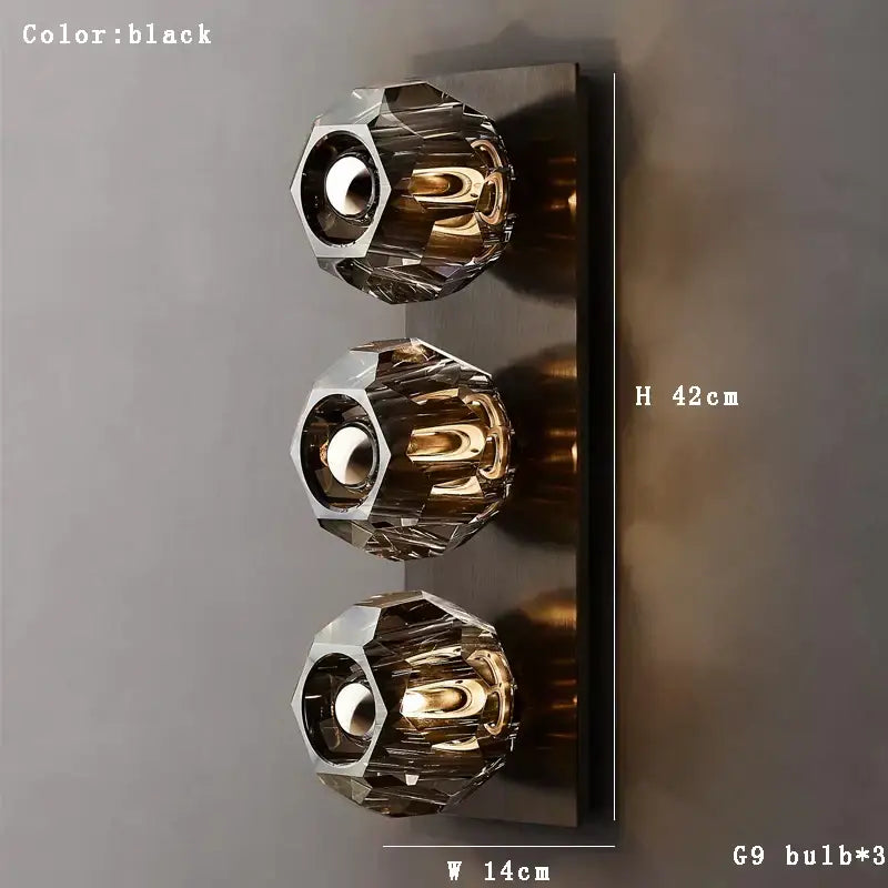 Black wall lamp with three gold faceted decorbites crystal luxury shades and sleek metallic base for living room decor