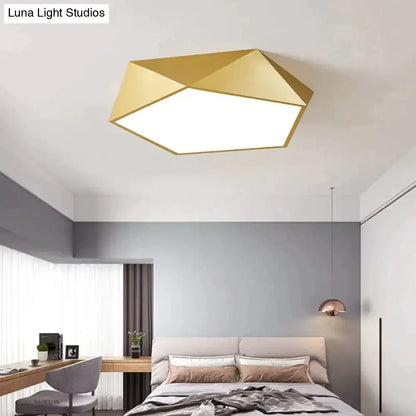 Gold geometric ceiling light with modern faceted design and sleek metallic finish for living room and bedroom lighting