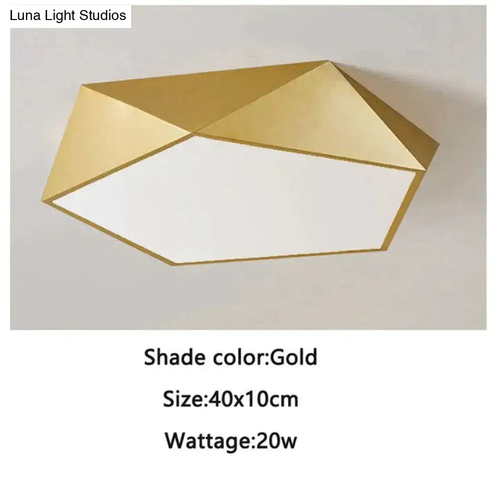 Gold geometric ceiling light with modern faceted design and white diffuser for living room and bedroom lighting