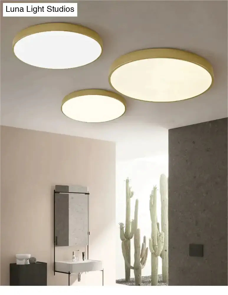 Three decorbites modern ceiling light fixtures with gold frames and soft white illumination for indoor use