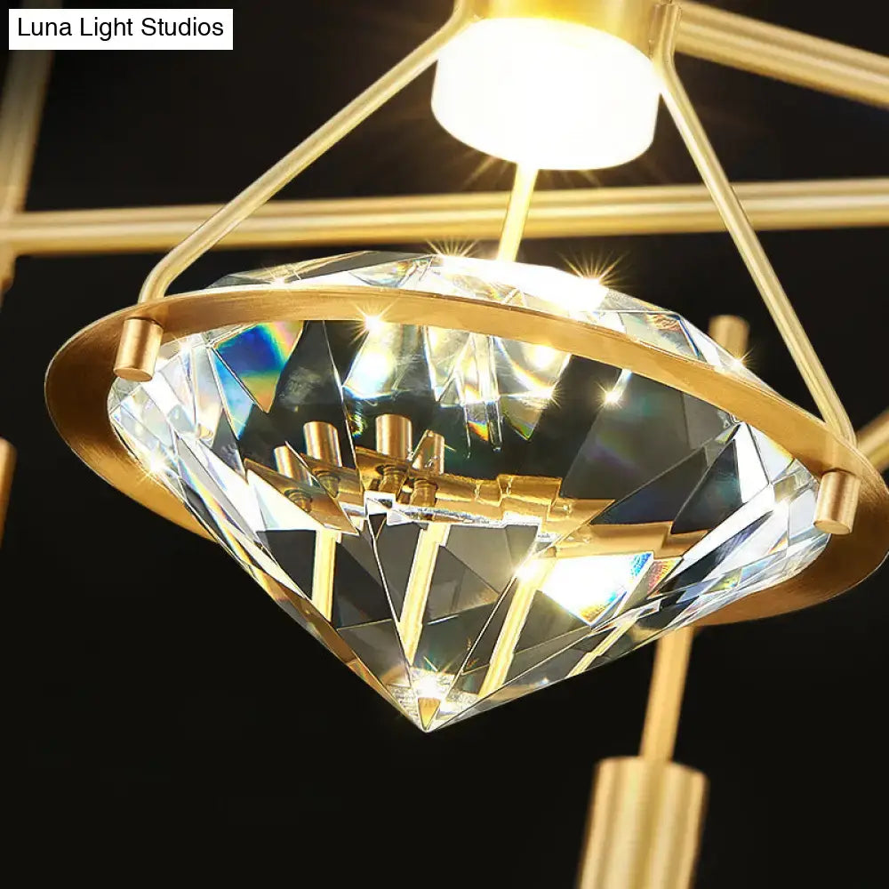 Modern gold finish crystal pendant light fixture featuring a gold-toned chandelier with faceted diamond centerpiece