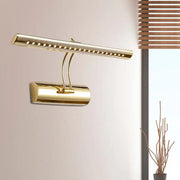 Modern gold finish metal led wall sconce with sleek elongated bar design and adjustable arm for bathroom picture lighting
