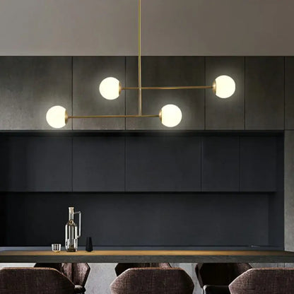 Decorbites minimalist gold finish pendant light with opal glass shade and four spherical bulb base brass bulbs