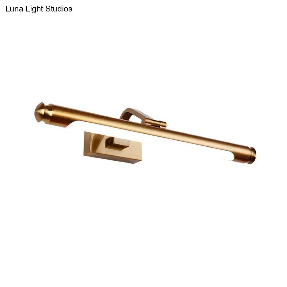 Gold finish tubed metal wall sconce with sleek elongated design and integrated led vanity light for kitchen use