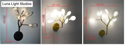 Modern gold firefly tree branch led wall light with gold-toned metal and clear glass teardrop bulbs for bedroom use