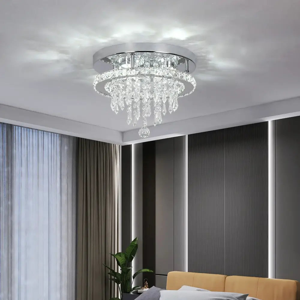 Modern gold five ring decorbites crystal ceiling chandelier with clear glass prisms and sleek chrome base for dining room light
