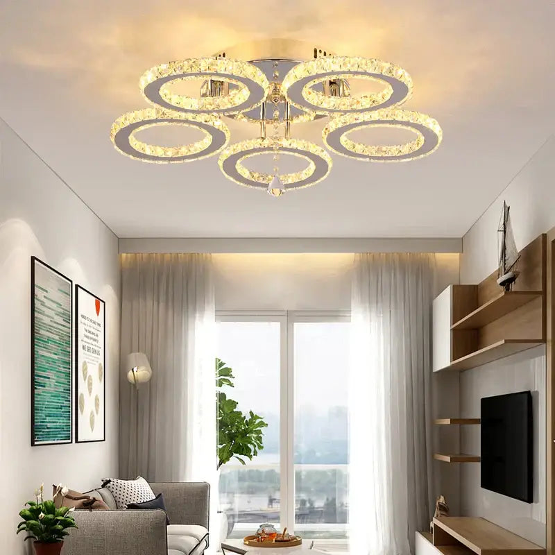 Modern gold five ring crystal ceiling chandelier with interlocking rings and clear crystals by decorbites crystal decor