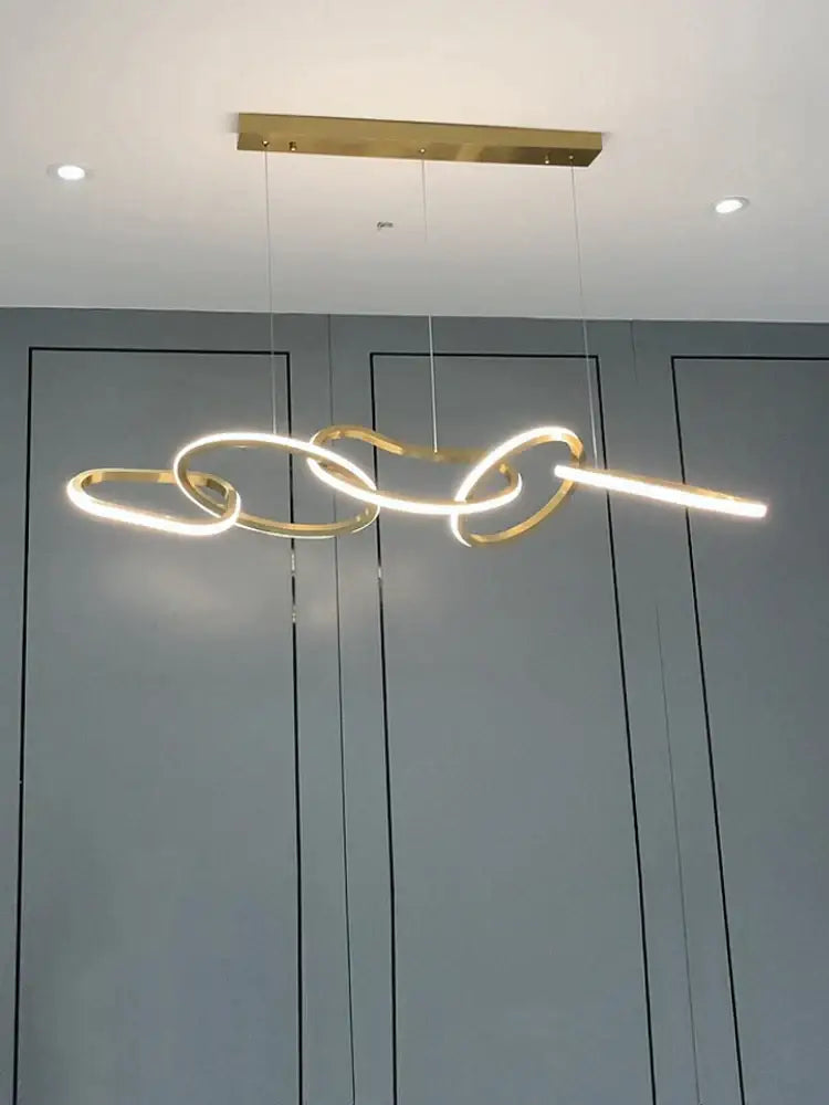 Modern gold flowing ring led decorbites elegant chandelier with sleek interlocking rings for dining bar lighting