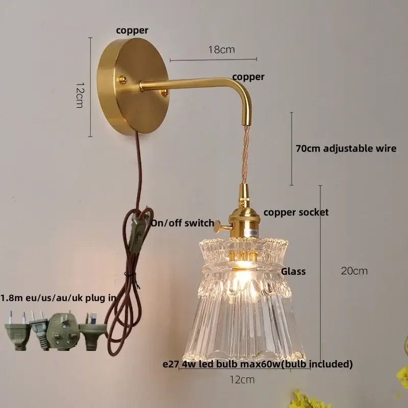 Modern gold fluted clear glass LED wall light with brass copper-finished wall mount and adjustable wire by decorbites clear glass