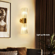Modern gold wall sconce with fluted crystal glass shades ideal for elegant living room decorbites crystal wall lighting