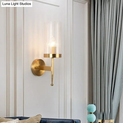 Modern gold wall lamp with fluted clear glass shade and slender design for 110v-120v 220v-240v use in living rooms