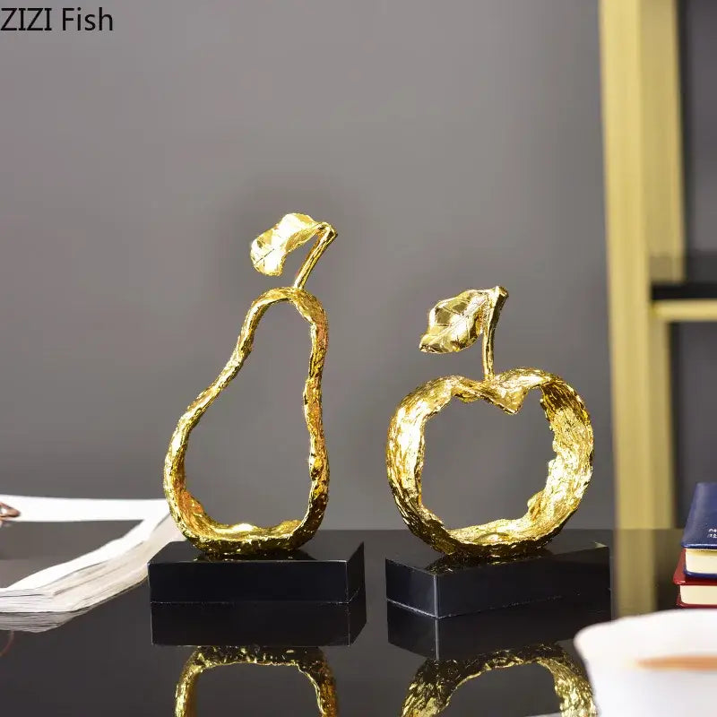 Modern gold fruit shaped metal crafts featuring textured pear and apple decorbites fruit shaped living room decor
